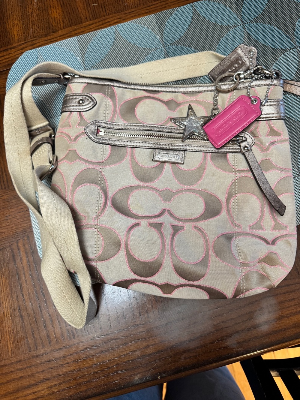 Coach Beige Crossbody Bag with Pink Logo Accents and Silver Hardware